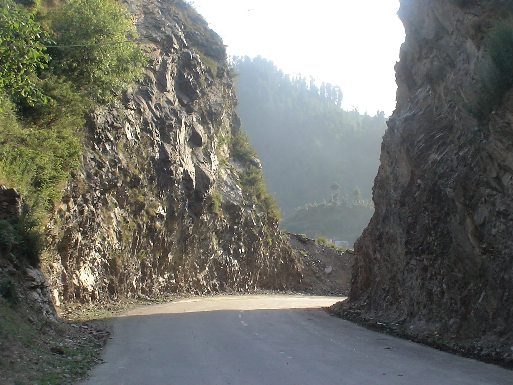 Mughal Road cutting through a rock gorge on the way to Peer Ki Gali