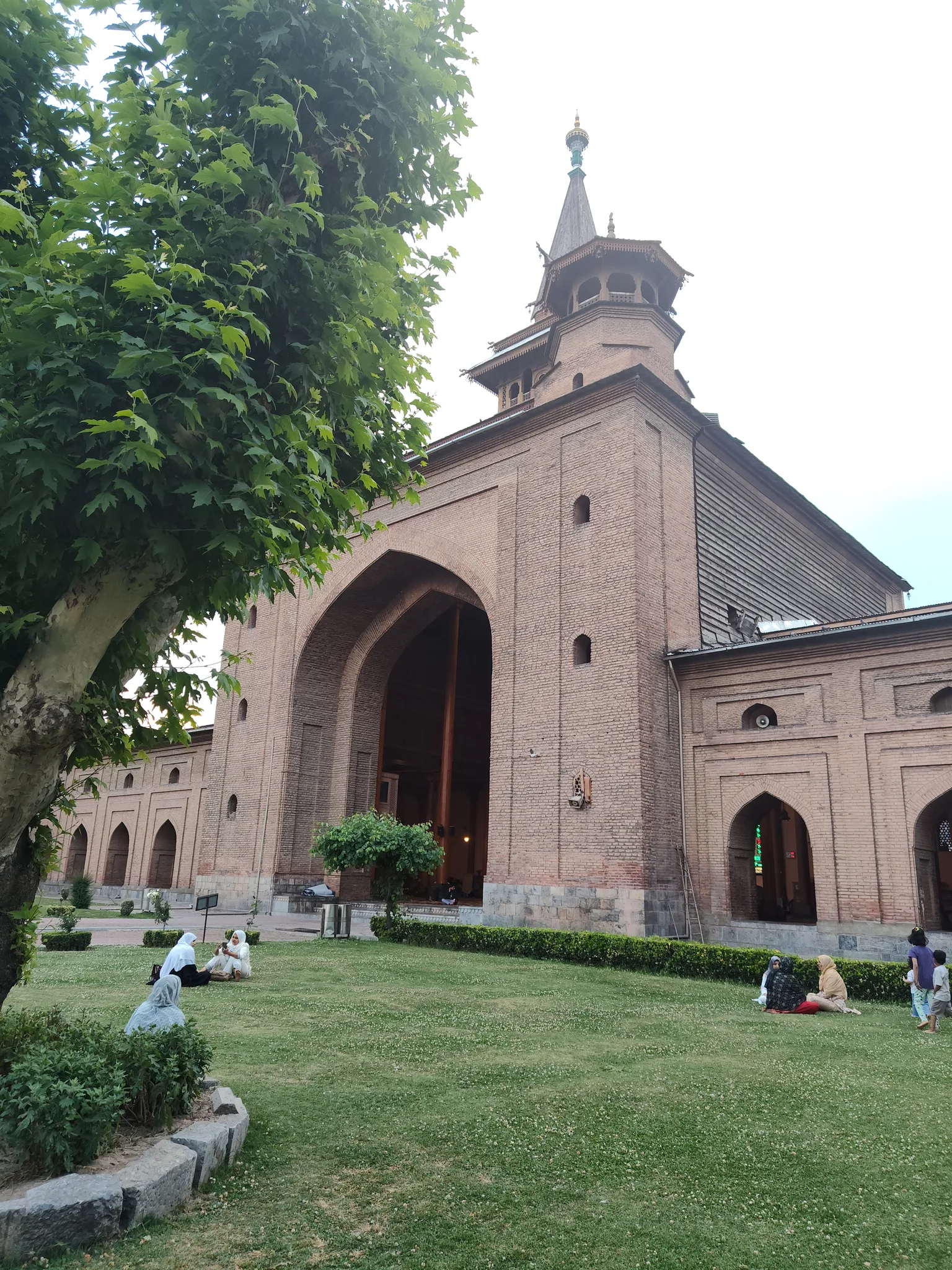 Brick arch and wooden spire of Jamia Masjid in Srinagar's old city